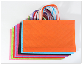 Multi-layer ultrasonic embossed non-woven fabric