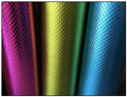 Metallic film lamination nonwoven